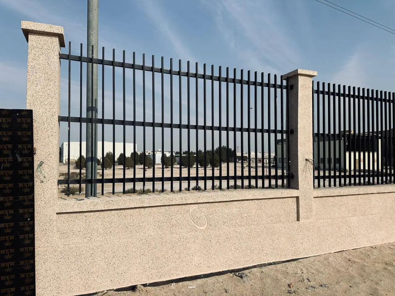 Concrete wall with steel railings
